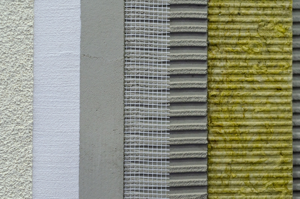 Close-up of external wall insulation systems and facade cladding.